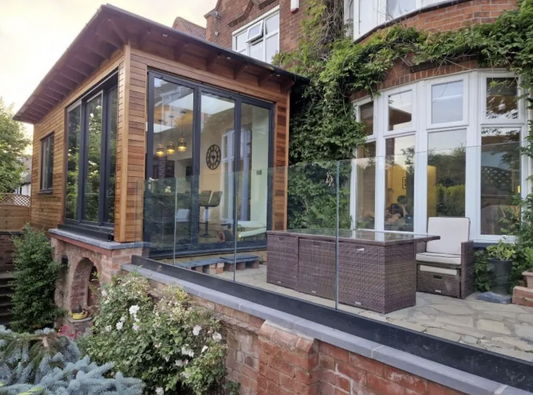 Integrating Drainage Solutions with Base Channel Glass Balustrades on Balconies